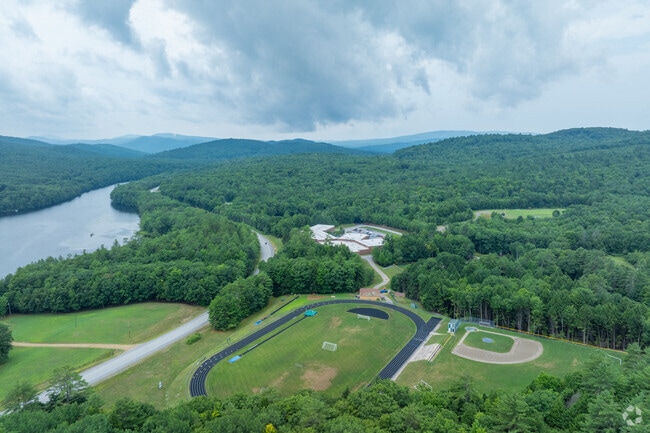 The Newfound Regional High School sits next to Route 3 and the Pemigewassett River.
