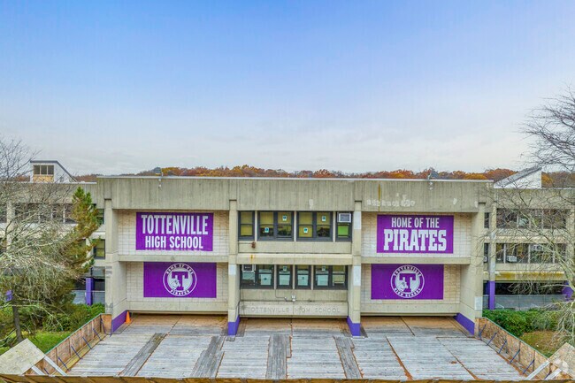 At Tottenville High School students engage in various educational activities.