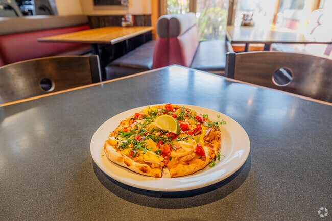 A unique thai chicken curry pizza from Fireside Pizza Company in Alpine Meadows.