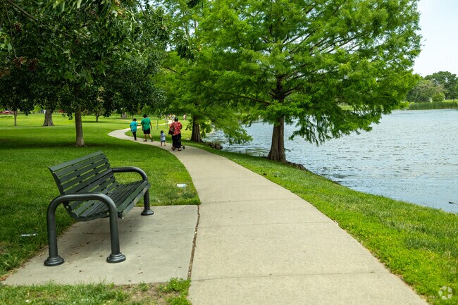 Enjoy a peaceful stroll by the lake at Benson Park, just a short drive from Wynnewood/Brookfield.
