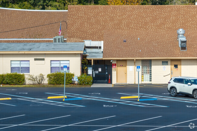 An entrance for students and faculty is located on the south side of Little Steps Academy.