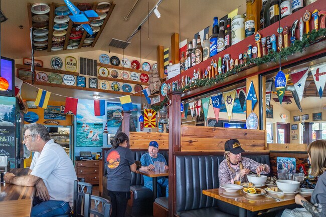 Sit at the bar or grab a booth at Tugboat Annie's in West Bay Drive.