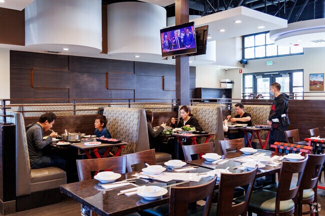 Positano residents enjoy a cozy hot pot meal at Happy Lamb.