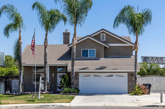Palm trees sway over tidy lawns in Riverview.