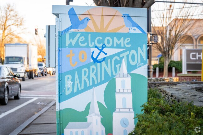 Bay Spring, RI welcomes you with its colorful sign, your gateway to Barrington's charm.