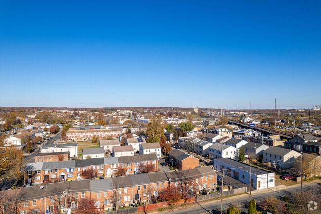 Attached homes sit close together with compact front and rear yards.