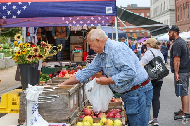 Pick through fresh fruits at the Concord Farmers Market.