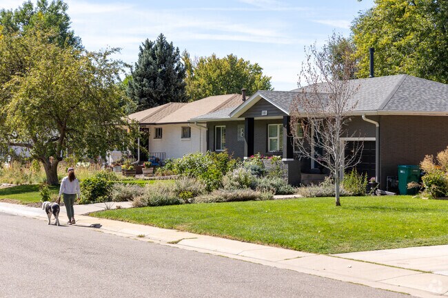 Modest homes with nice yards line the Arapahoe Acres streets.