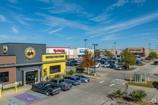 The shopping plaza in Ferguson has many chain stores available for their residents.
