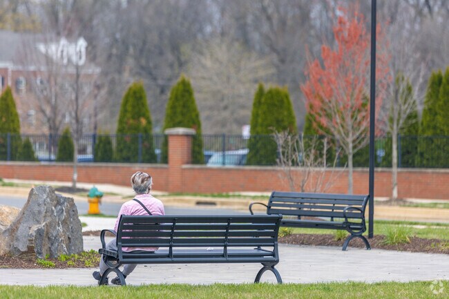 Grab a book and step outside of the Claymont Library to enjoy the weather.