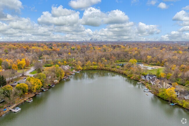 Homes around Lake Mallard in Devon feature spacious lots and serene waterfront views.