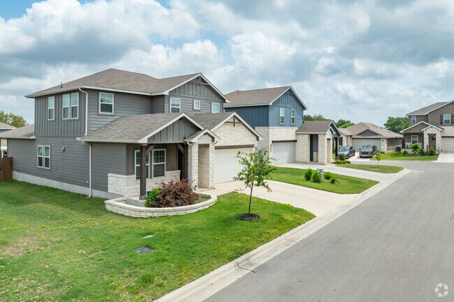 A row of newly developed traditional homes located in Manchaca.