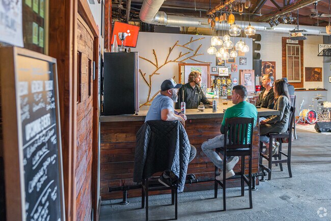 Patrons chat at the bar at Blue Island Beer Company's Cabbage Bash in Blue Island.
