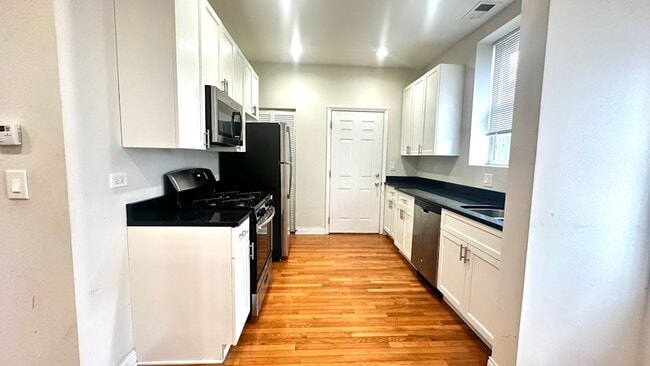 1145 W Lunt Ave unit 1157-3, Chicago, IL 60626 - photo 2