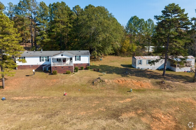 Away from the center of Hickory Grove homes are often set way back from the road for privacy.