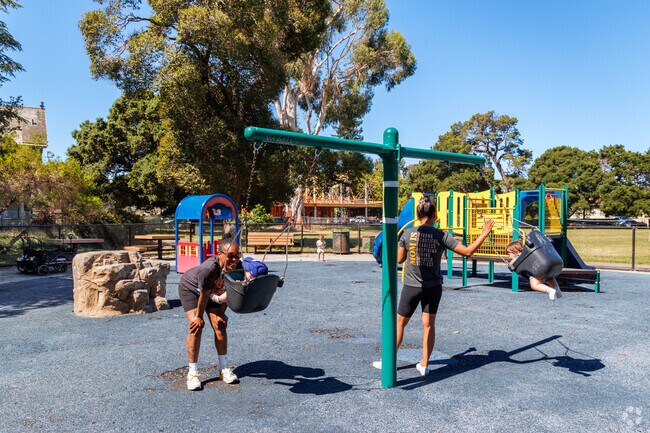 Mosswood Park featuring modern play structures and welcoming environment for families.