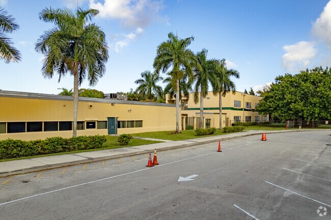Palm trees adorn the campus of Royal Palm Elementary School in Lauderhill, FL.