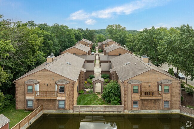 Two large condo complexes sit at the entrance of Meadows.