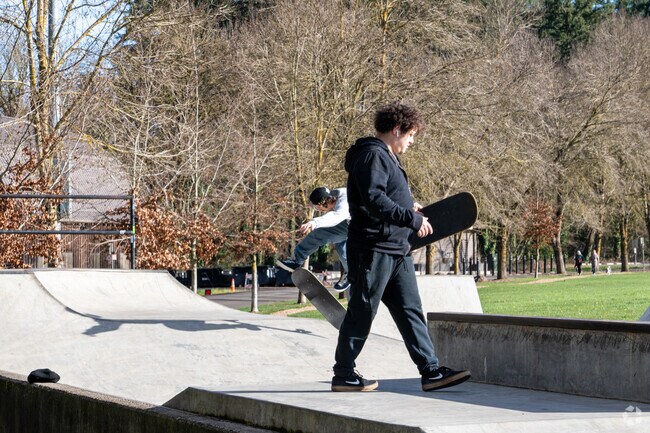 Children and adults enjoy the skate park featured in Memorial Park.