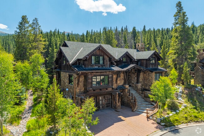 In Copper Mountain, Frisco, CO you'll found stunning cobblestone two stories with amazing views.