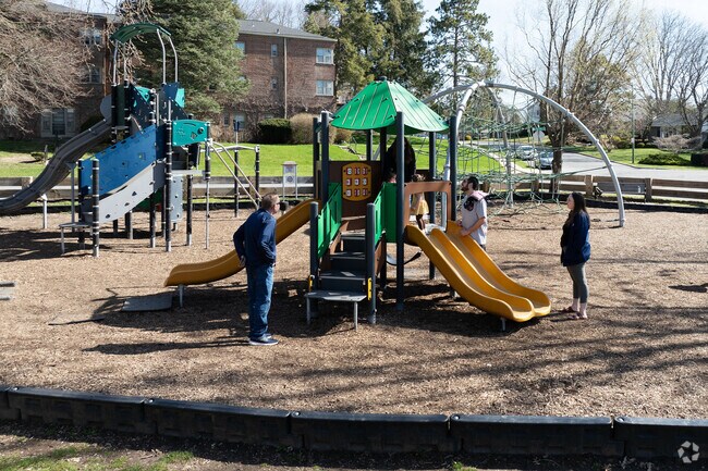 Families play as children meet new friends in Buckingham Lake-Crestwood.