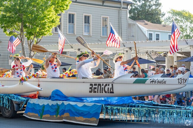 The Benicia Outrigger Canoe Club represents at the Benicia Torchlight Parade.