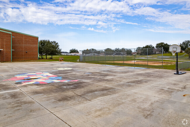 Students love to play hoops on the basketball courts at Pine Ridge Elementary School in Clermont