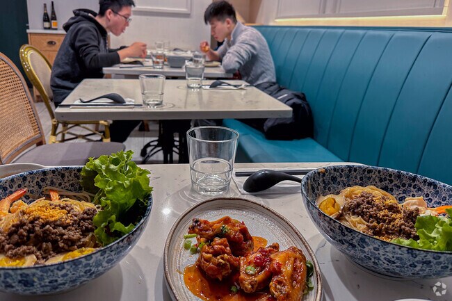 Diners enjoy Em Vietnamese Bistro