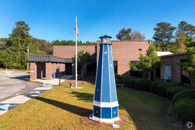There is a replica light house in front of the St. Stephen Elementary School.