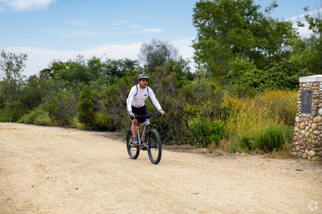 A boy rides his bike through Otay Valley Regional Park in Otay Mesa West.