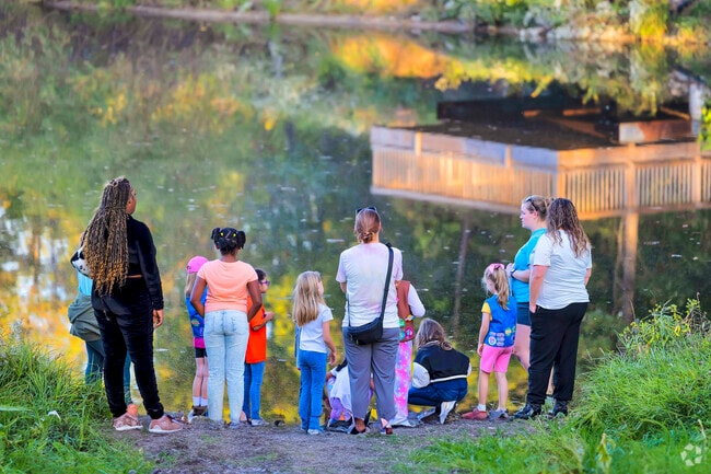 Rock Springs Conservation Area inspires curiosity as kids explore the water’s edge.