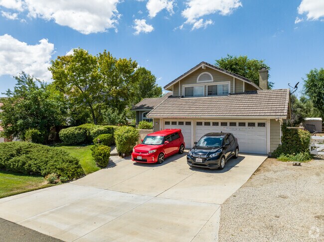 Acton offers diverse home styles, many featuring spacious indoor garages.