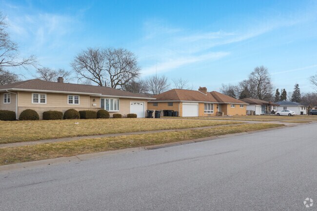 The Far West Side residential streets lack trees but abound in green lawns.