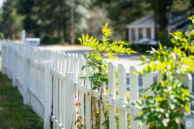 White picket fences surround many front yards in Burton Heights.