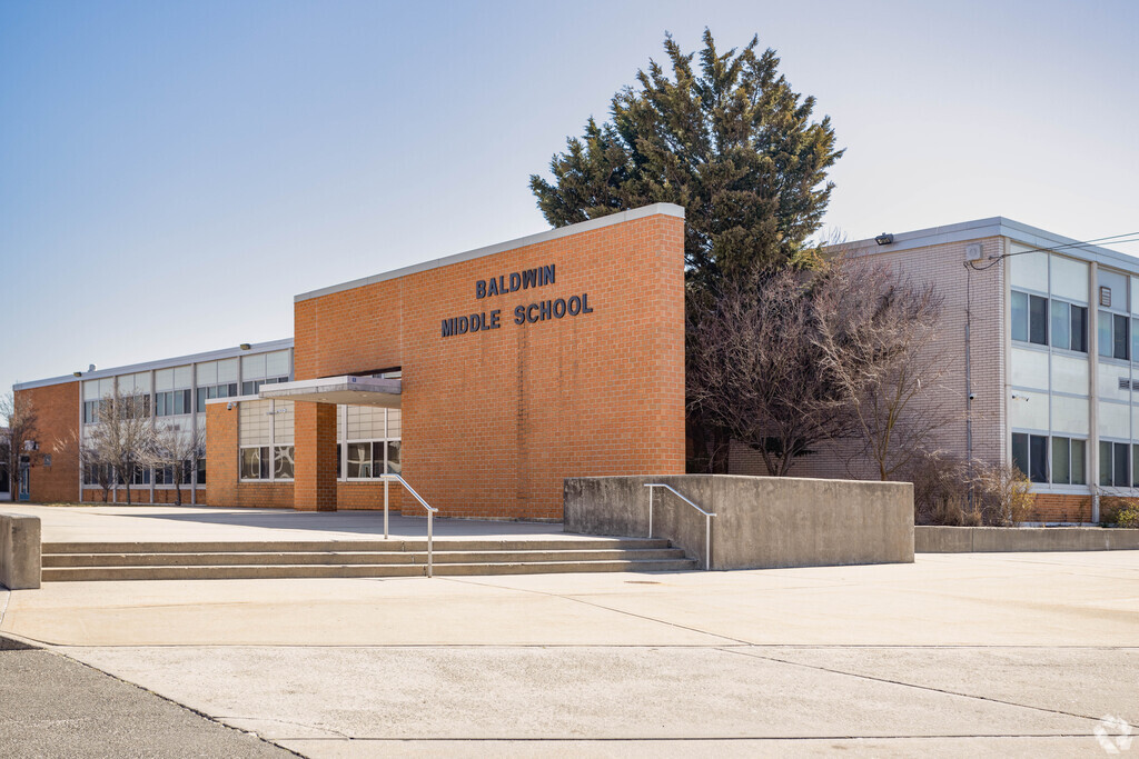 The entrance of Baldwin Middle School in Baldwin, NY is set back off the roadway.