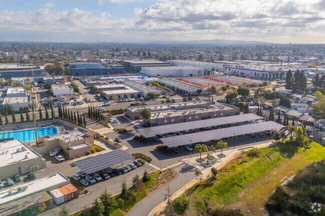 Sweeping views of Coast High School and the surrounding landscape and neighborhood.