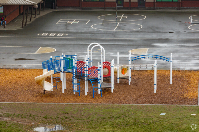Orchards Elementary School in Vancouver, WA has blacktop games and a playground.