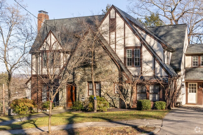 This beautiful Tudor sits high on a hill giving the residents a wide view over Newtonville.