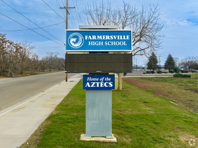 A lighted marquee welcomes students to the entrance to Farmersville High School.