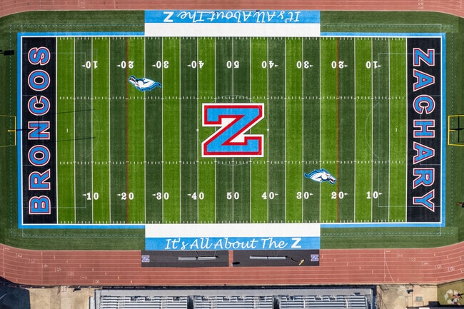 Watch a nail biting Friday night game at Zachary High School.