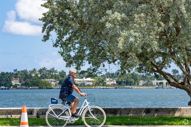 A man enjoys a scenic bike ride along Flagler in Palm Beach Lakes.