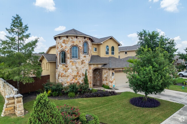 This stunning Parkside house boasts a captivating rounded turret crafted from elegant Spanish brick, adding unique character and charm to its appeal.