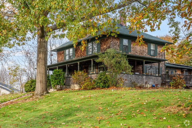 Larger homes sit on the hilltops of Garden Hills.