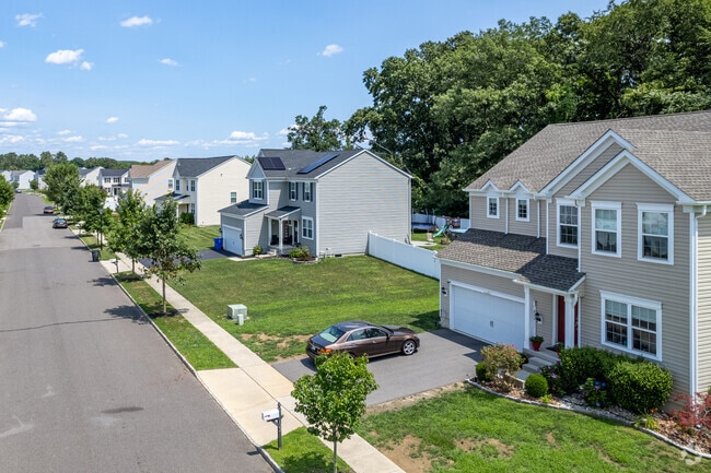 Traditional and modern colonial-style homes in Florence were built in the early 2000s.