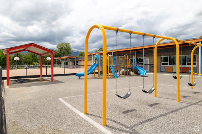 Adams Elementary School has multiple playgrounds for children to use during recess.