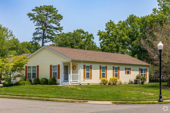 Many of the homes in McKee City are surrounded by the local flora, providing plenty of shade.