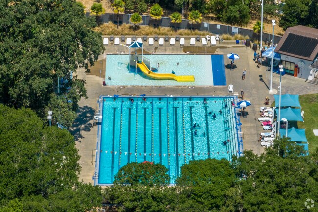 Learn with friends how to swim at the public Hamilton Community Pool.