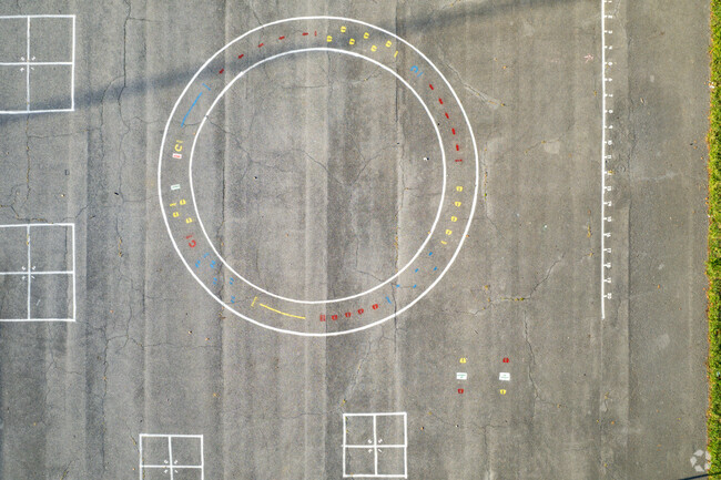 A hop skip jump ring and four square for students to enjoy on their free time at Mooreland.