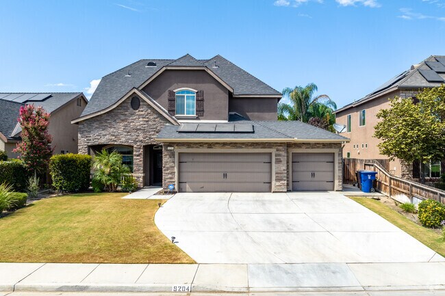 A modern and spacious single-family home with a three-car garage in Campus Park.