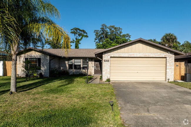 Brick and stone front L-shaped ranches are abundant in Allandale.